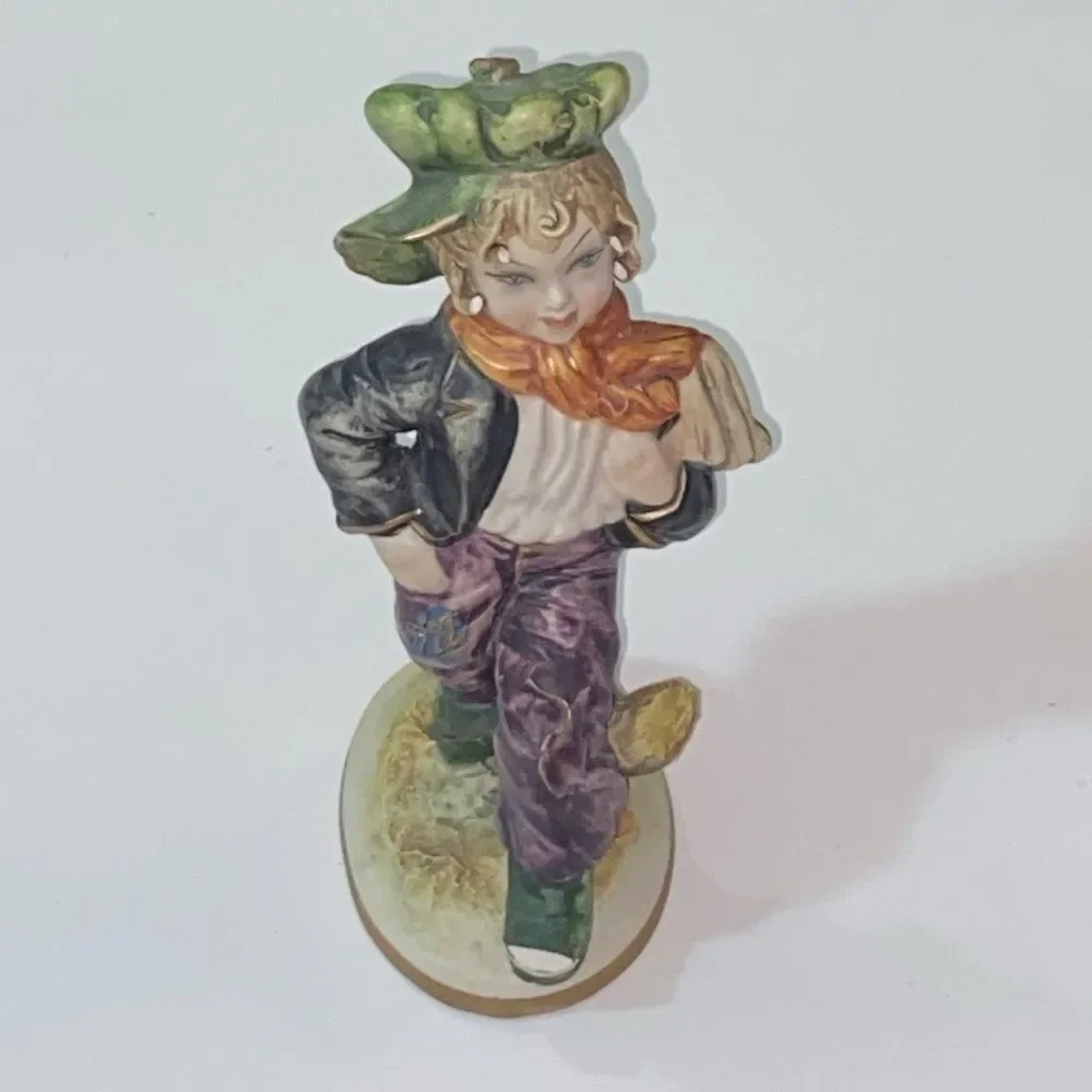 Vintage Colorful Porcelain Figurine with Green Hat